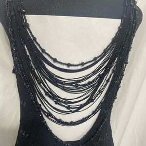 Reign On. Black sequin lace formal dress. Beaded back accent. Size 11-12